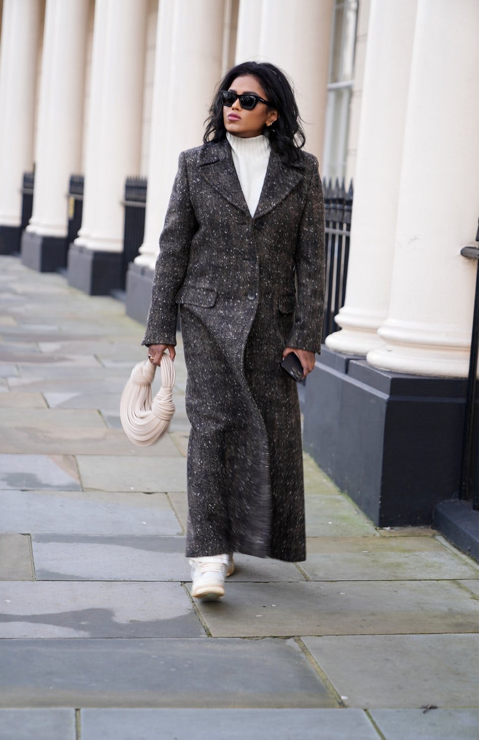 Sachini Dilanka wearing a Long Herringbone Wool Coat in London
