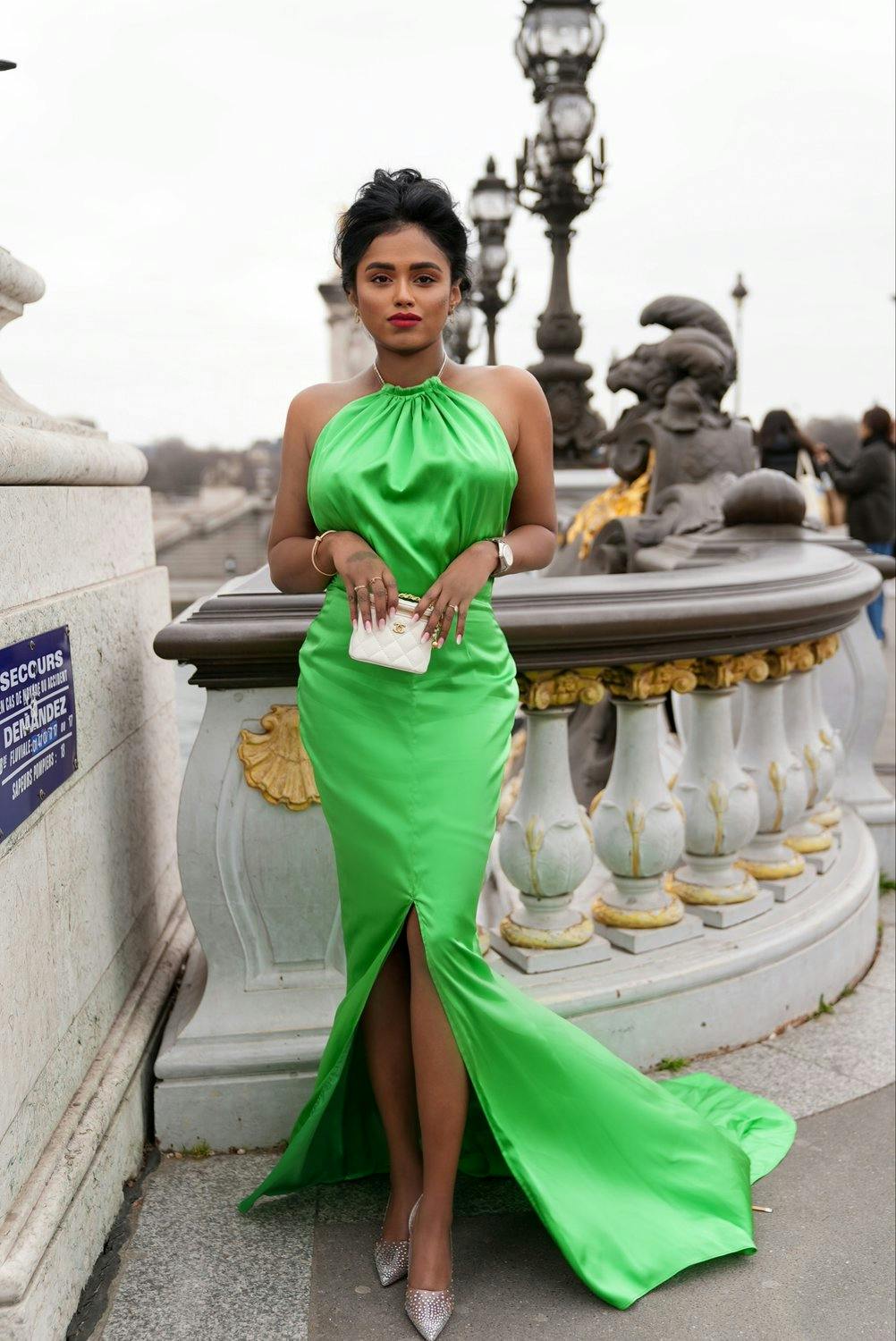 Sachini Dilanka wearing a green dress in Paris