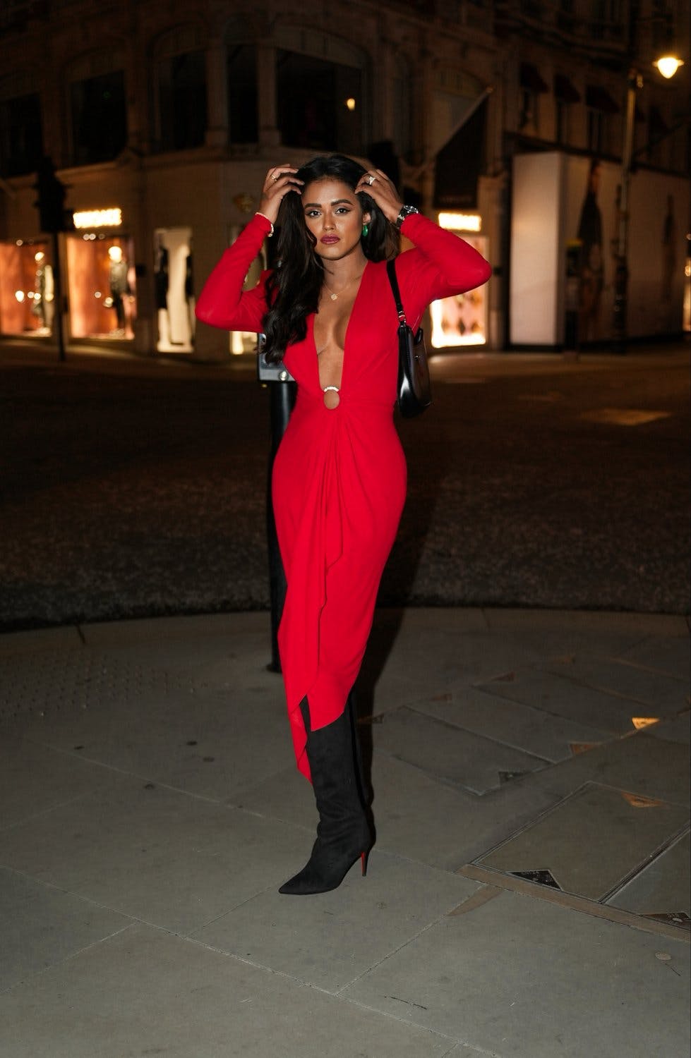 Sachini Dilanka wearing a red Alexandre Vauthier dress in London