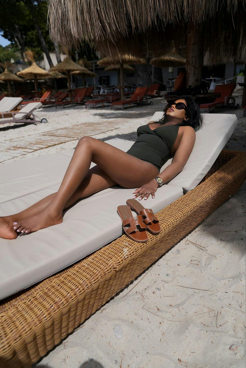 Sachini Dilanka wearing Toteme swimsuit in Palma beach