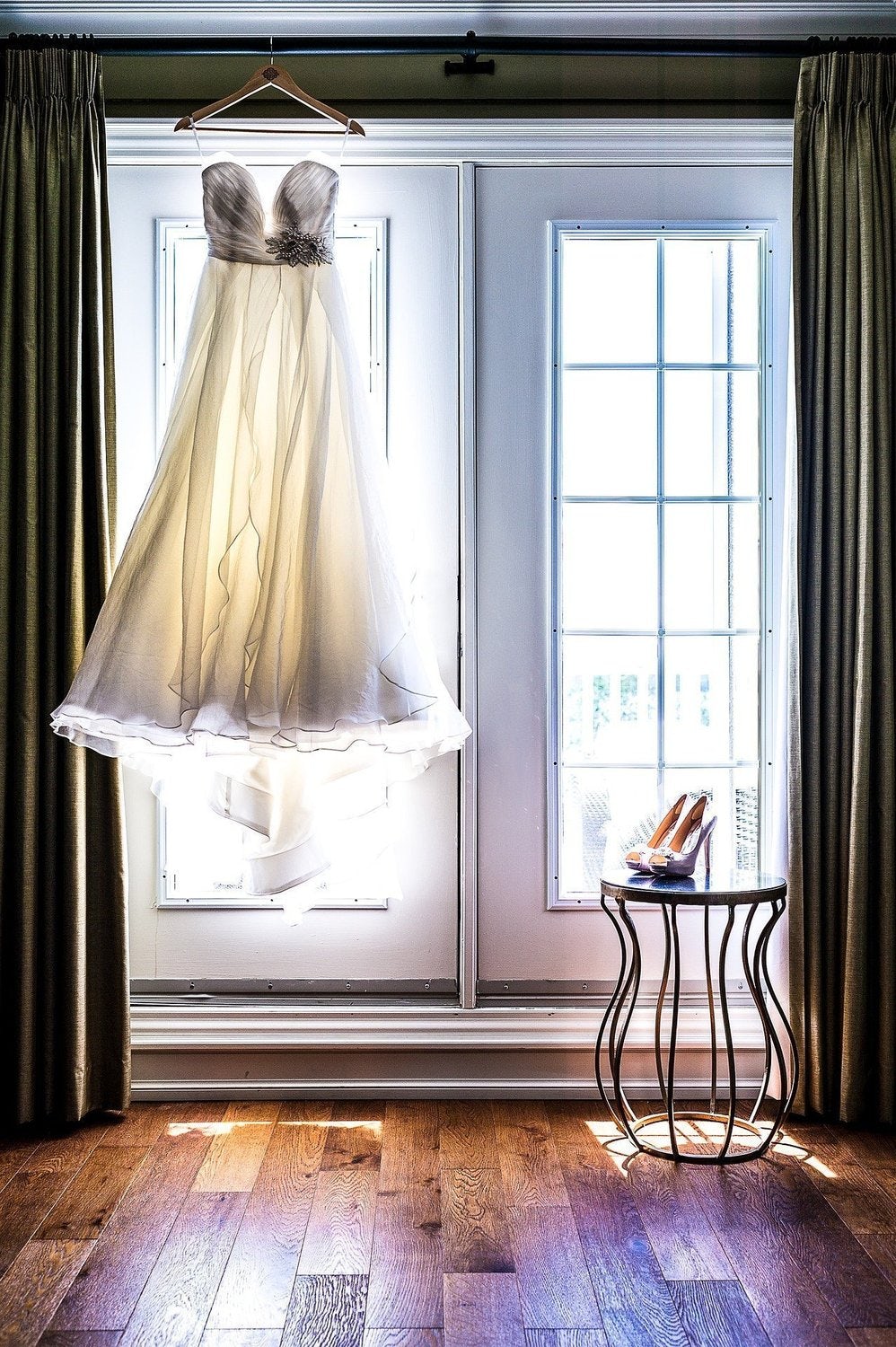 dress hanging in front of window