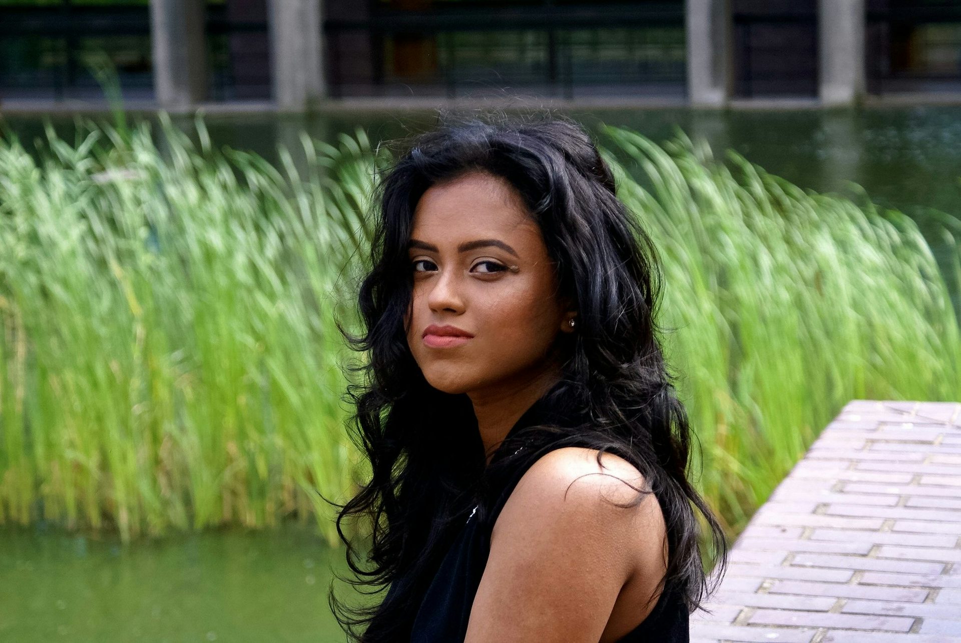 Sachini in front of a canal