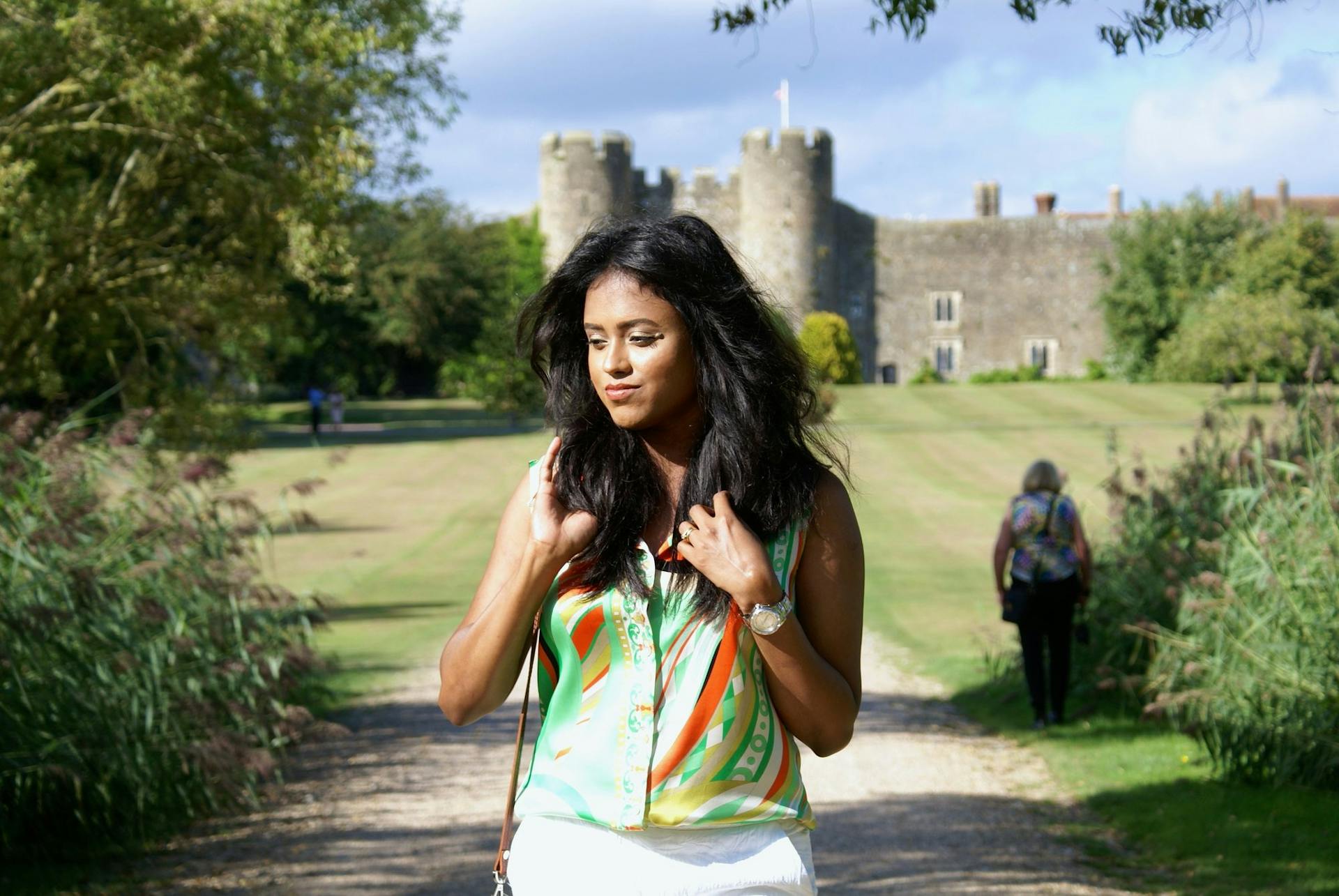 Sachini in front of a castle