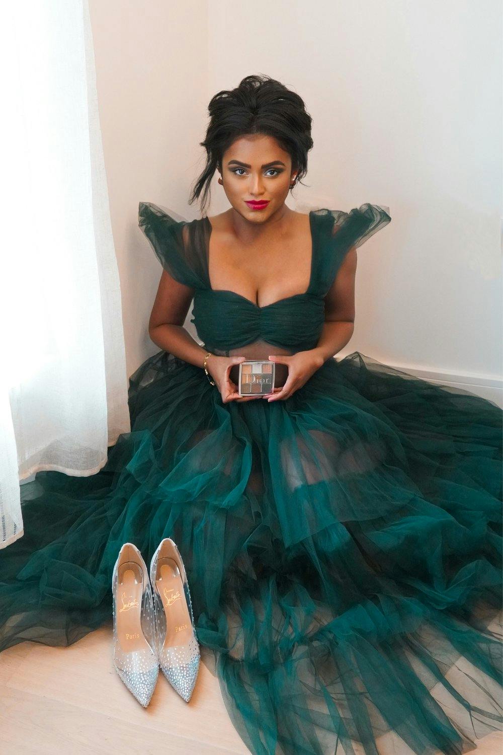 Sachini wearing a Green Tulle Princess Dress with Dior Beauty makeup