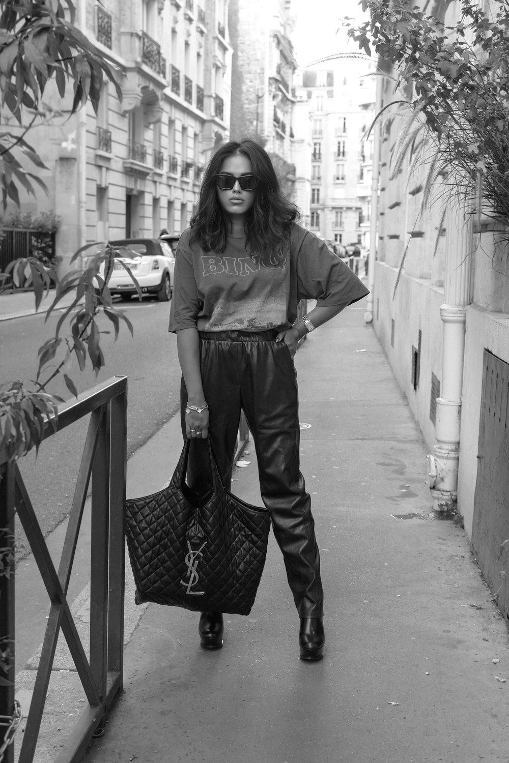 Sachini wearing Annie Bing t-shirt, trousers and & other stories boots in paris