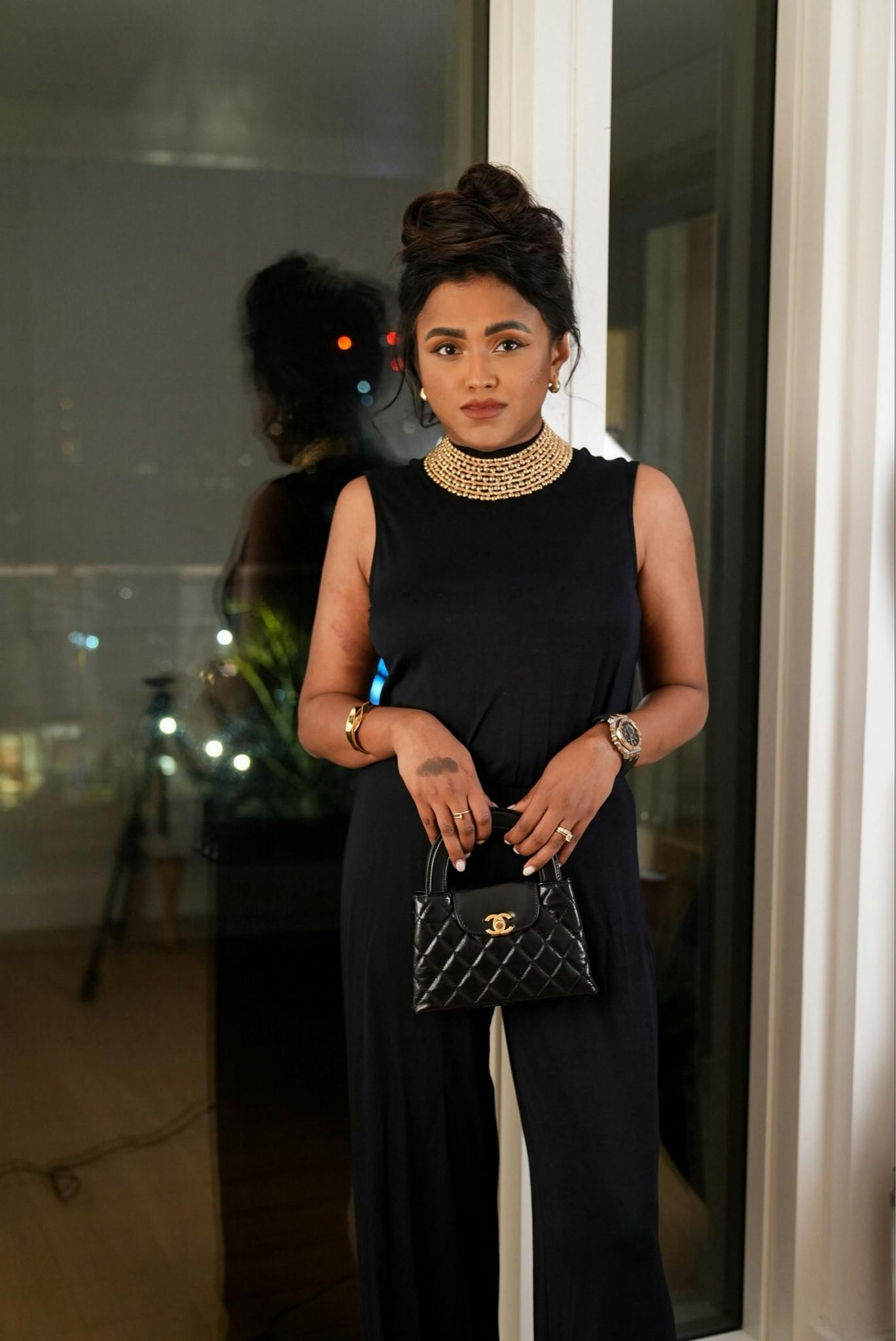 Date night glam, jumpsuit, winter outfit, night outfit, statement necklace, Chanel Kelly, ootn